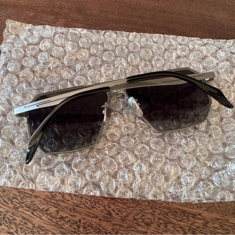 NWT! Titanium Sunglasses in Silver with Black Case - Picture 9 of 12